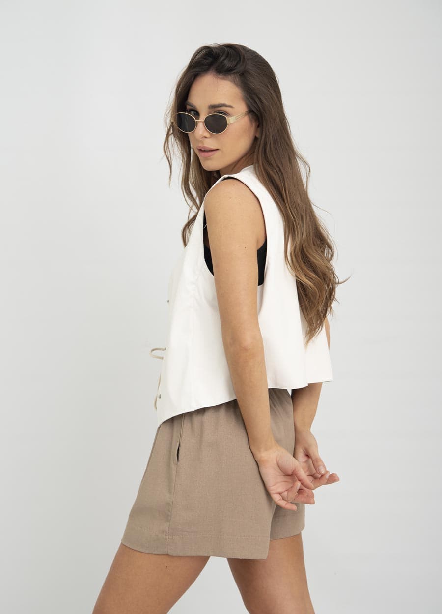 Chaleco eco cuero con broches