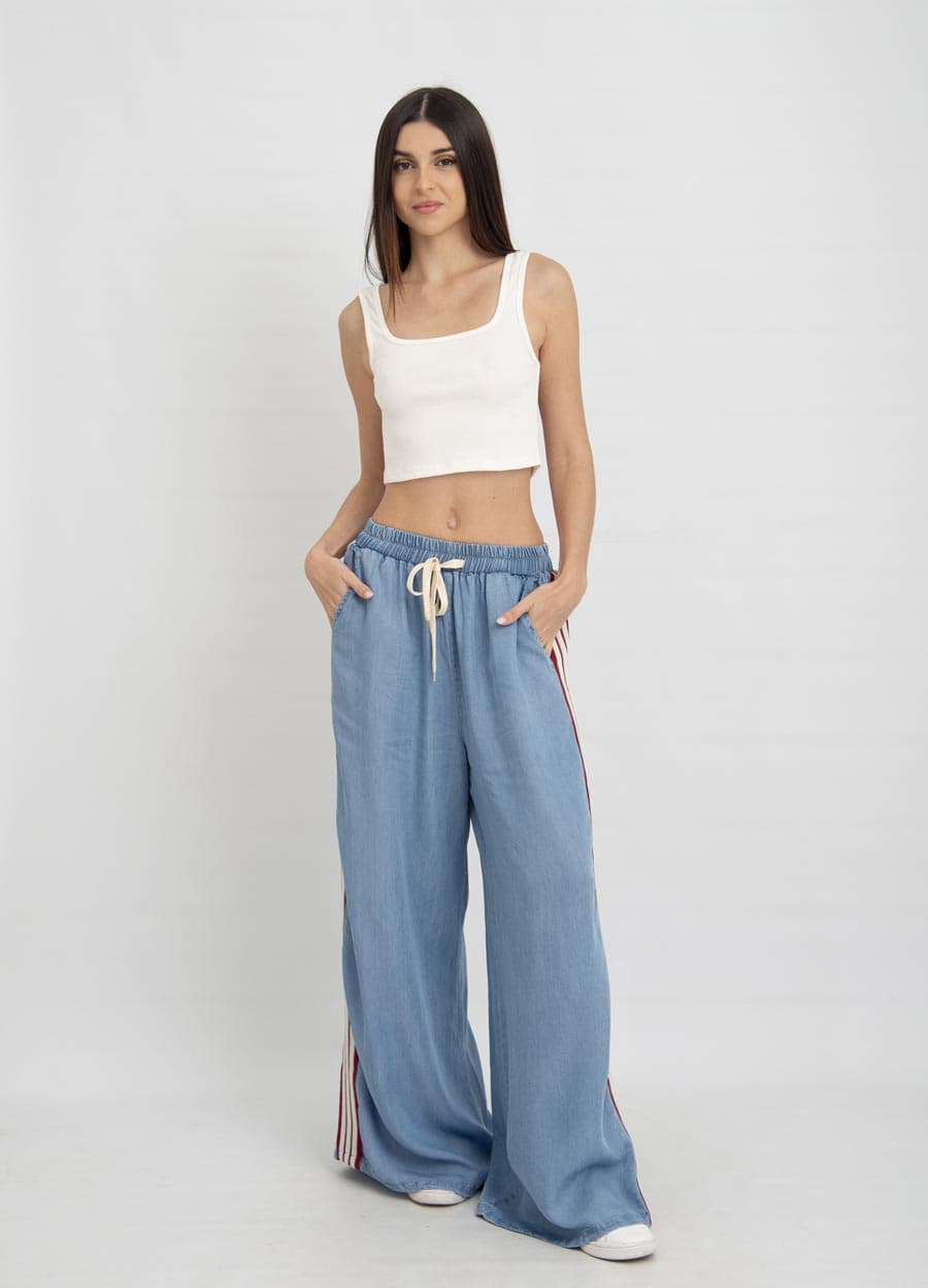 Pantalon denim con tira lateral