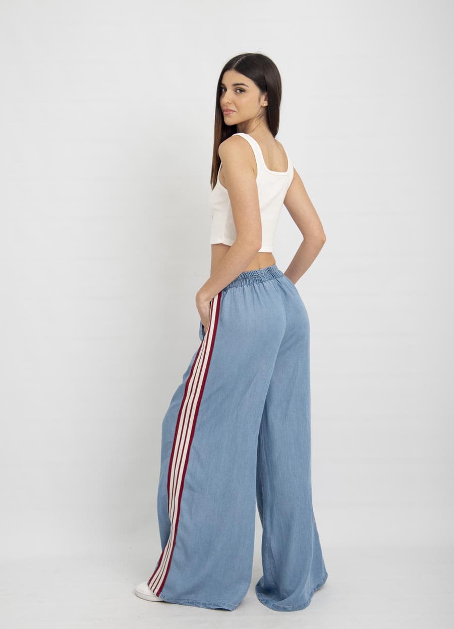 Pantalon denim con tira lateral